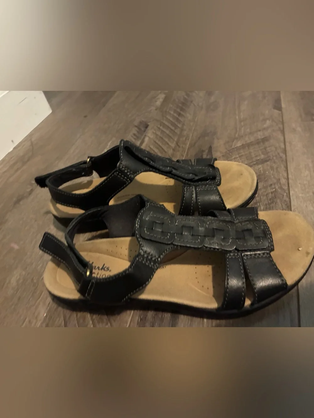Clarks Black Strap Sandals with Tan Footbed